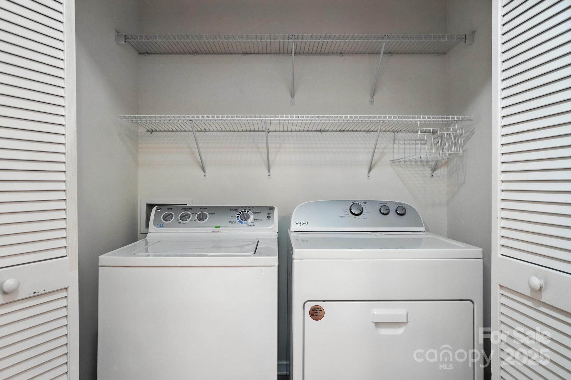 13116 Erwin Road Charlotte, NC 28273 - Photo 27 of 27 a utility room with dryer and washer