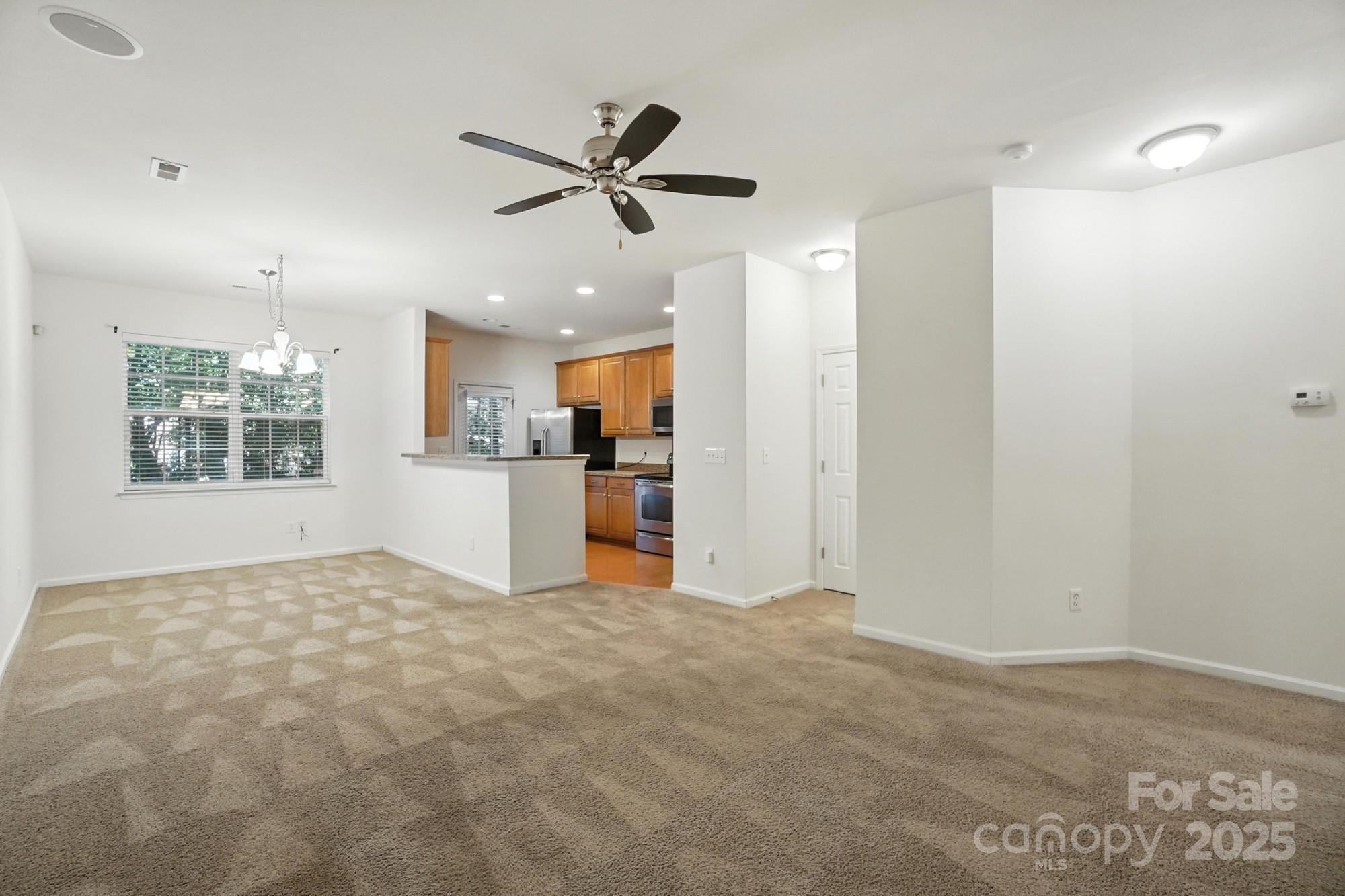 13116 Erwin Road Charlotte, NC 28273 - Photo 7 of 27 a view of a kitchen with a sink and a window
