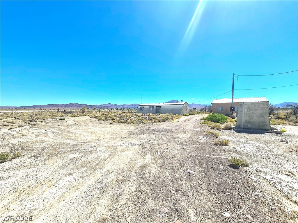 11545 South Spring Meadows Road Pahrump, NV 89060 - Photo 3 of 33 Expansive desert views provide a unique canvas for your vision, perfect for outdoor living.