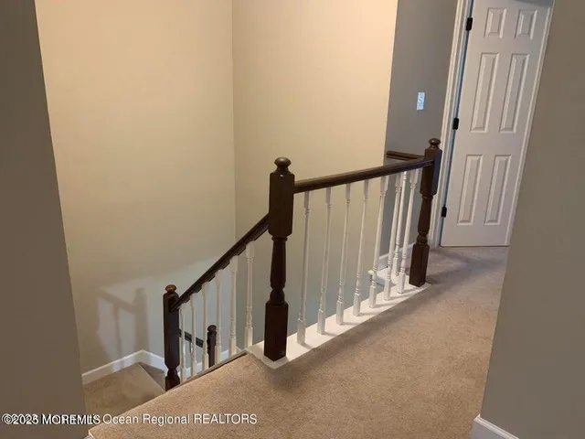 a view of a stairs and an entryway