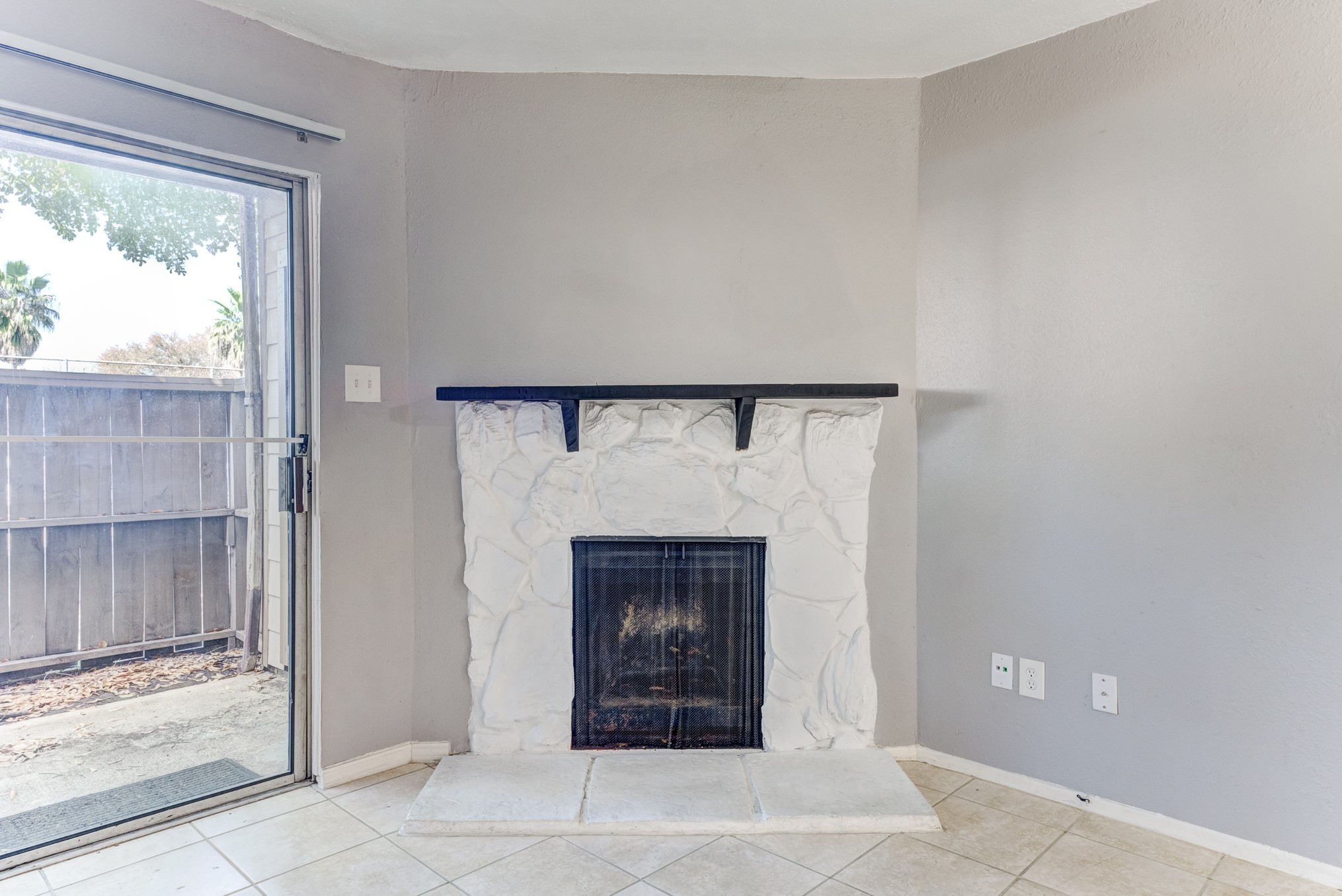 6001 Reims Road, Unit 1101 Houston, TX 77036 - Photo 14 of 35 a room with a fireplace