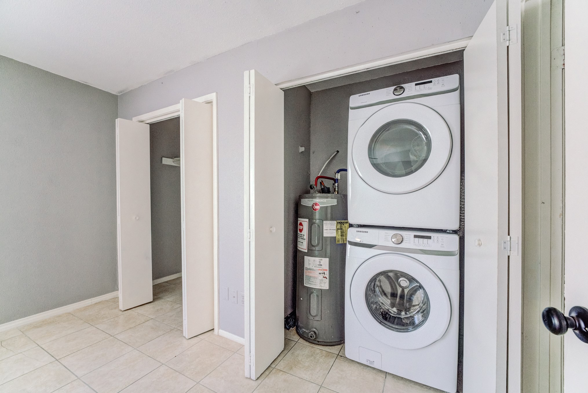 6001 Reims Road, Unit 1101 Houston, TX 77036 - Photo 31 of 35 a utility room with dryer and washer