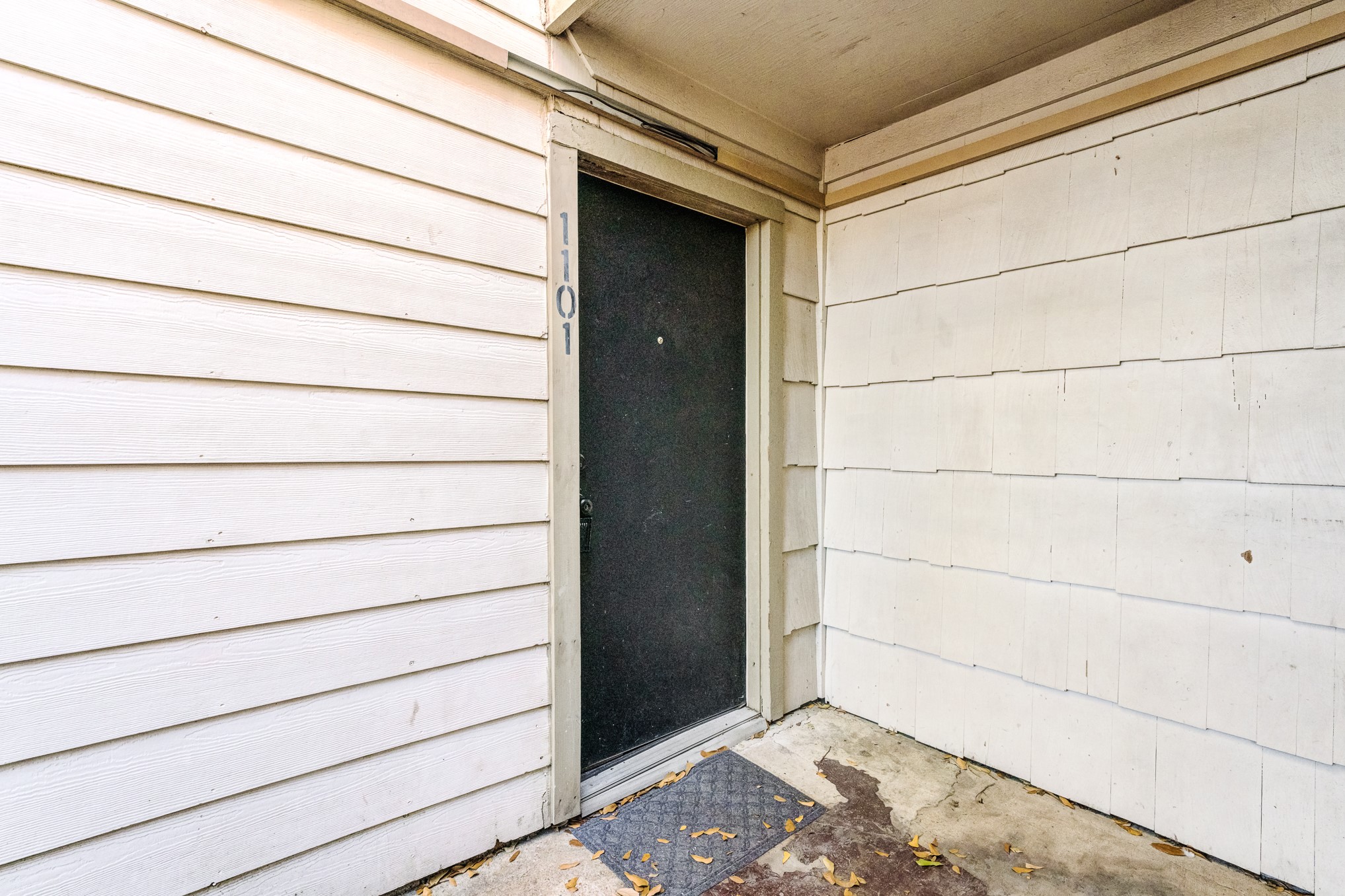 6001 Reims Road, Unit 1101 Houston, TX 77036 - Photo 34 of 35 a view of a wooden door