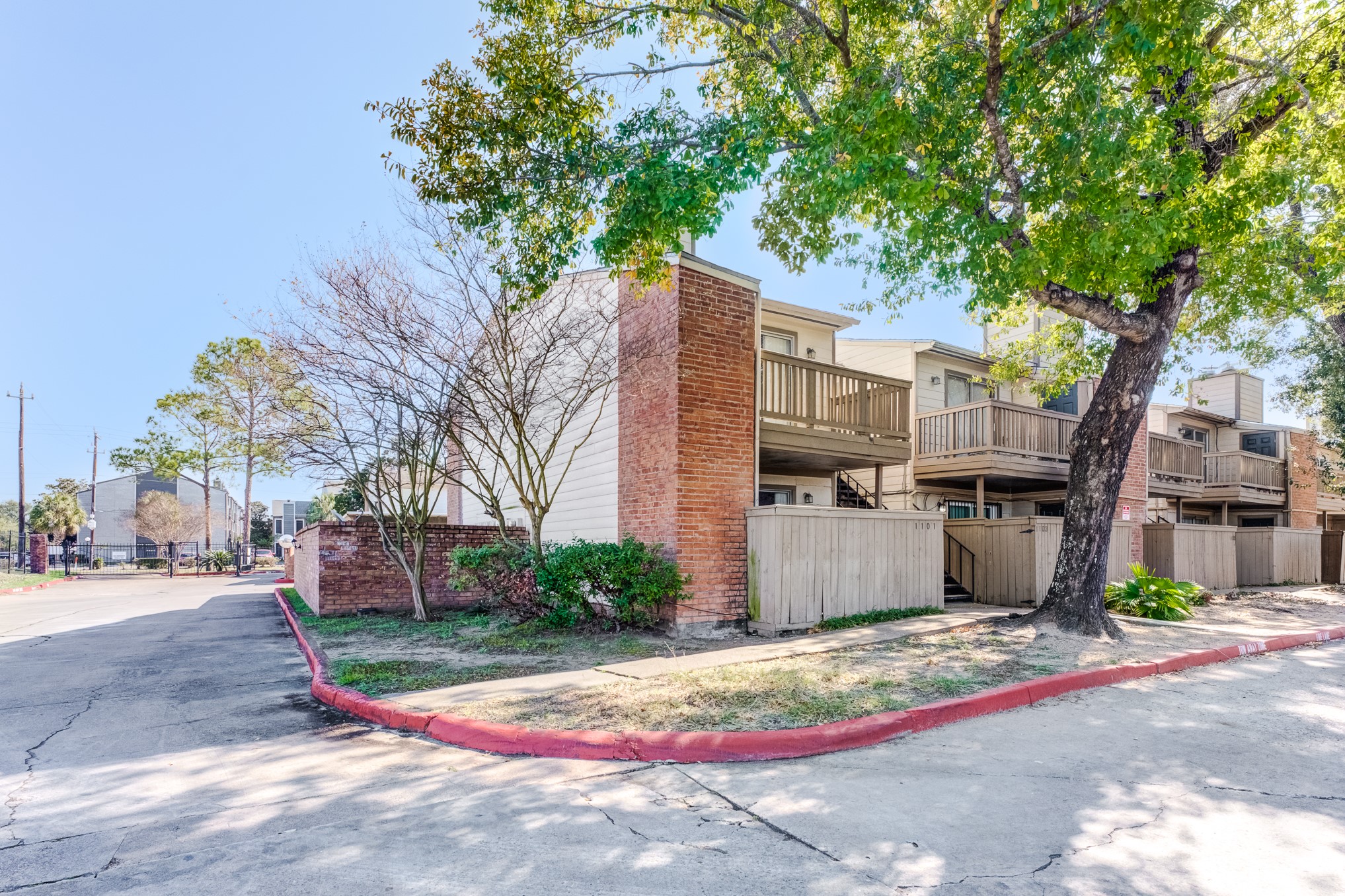 6001 Reims Road, Unit 1101 Houston, TX 77036 - Photo 4 of 35 a backyard of a house with lots of green space