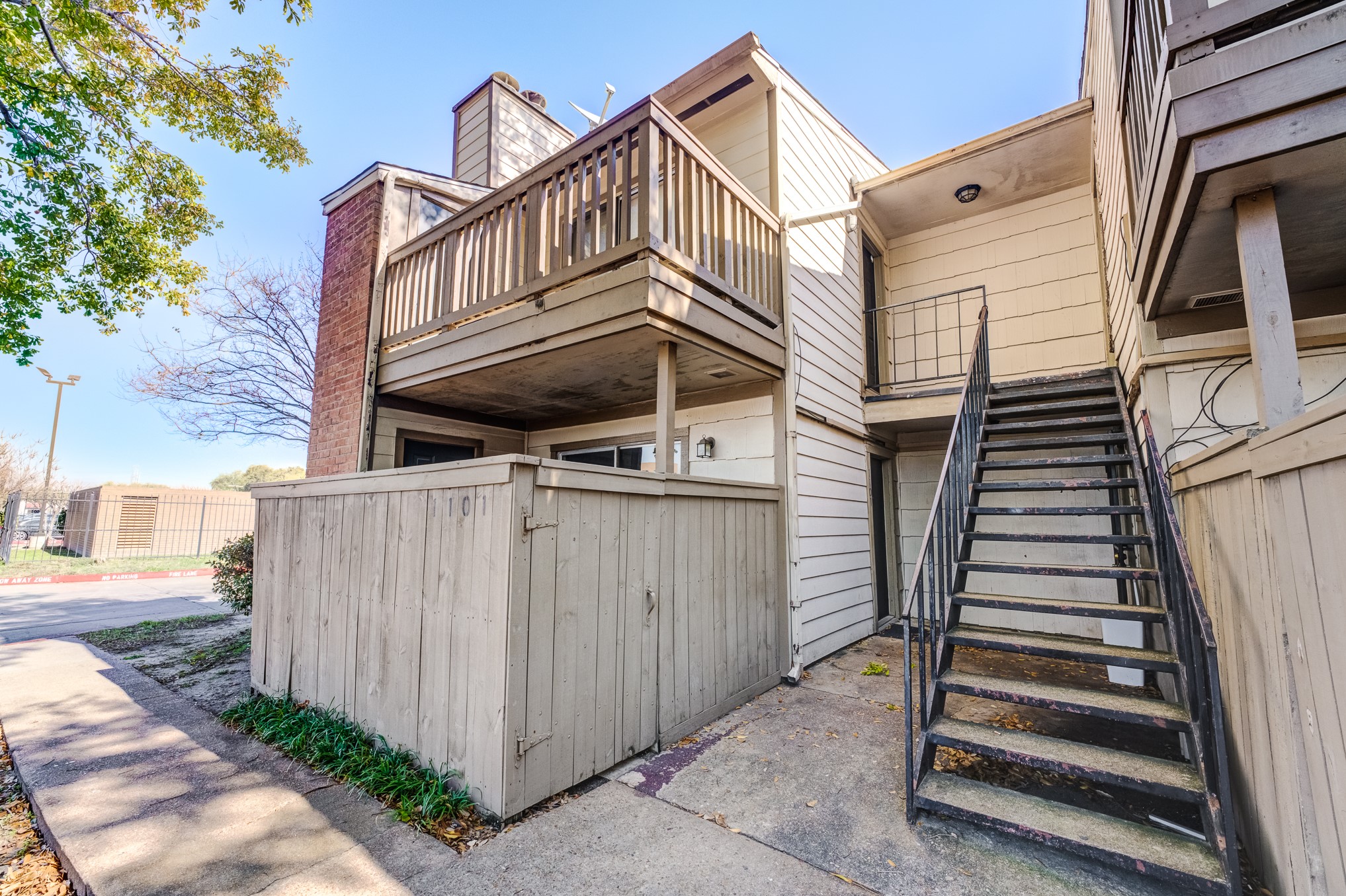 6001 Reims Road, Unit 1101 Houston, TX 77036 - Photo 6 of 35 a view of a street with building