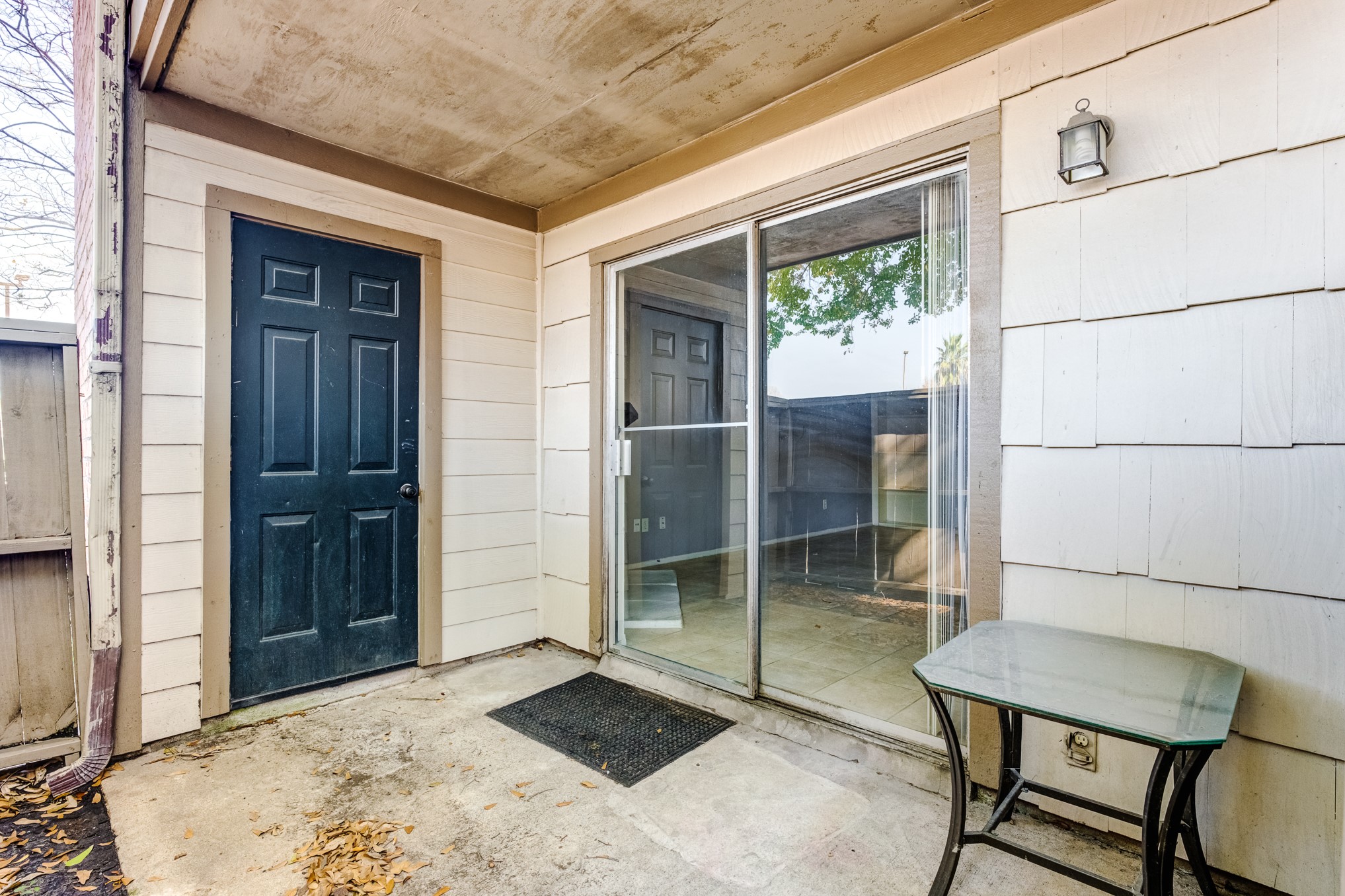 6001 Reims Road, Unit 1101 Houston, TX 77036 - Photo 8 of 35 a backyard of a house with barbeque oven table and chairs
