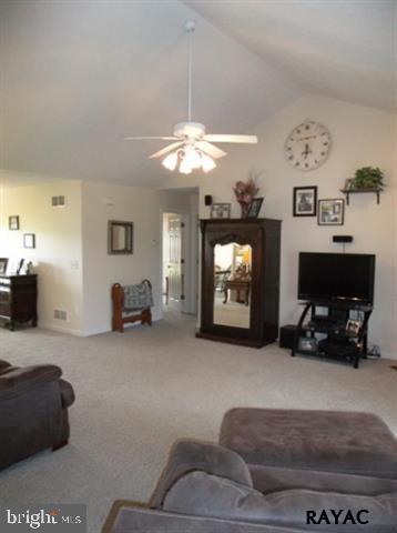 3008 Bowser Road New Freedom, PA 17349 - Photo 16 of 36 a living room with furniture and a flat screen tv
