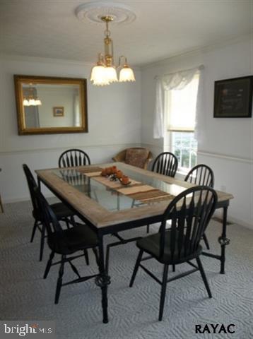 3008 Bowser Road New Freedom, PA 17349 - Photo 17 of 36 a view of a dining room and chandelier