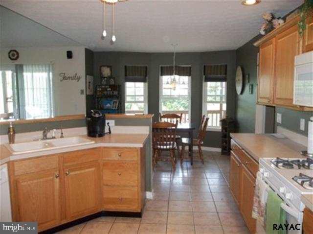 3008 Bowser Road New Freedom, PA 17349 - Photo 18 of 36 a kitchen with sink and cabinets