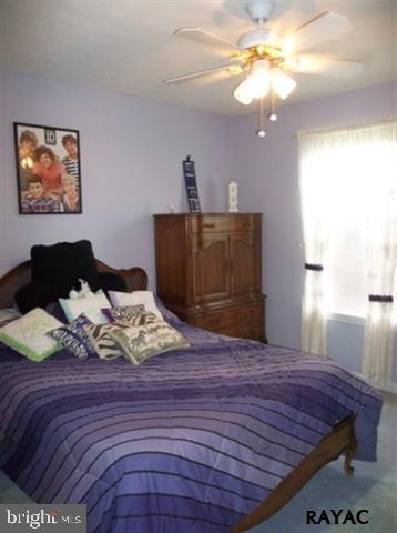 3008 Bowser Road New Freedom, PA 17349 - Photo 25 of 36 a bedroom with a bed dresser and a window