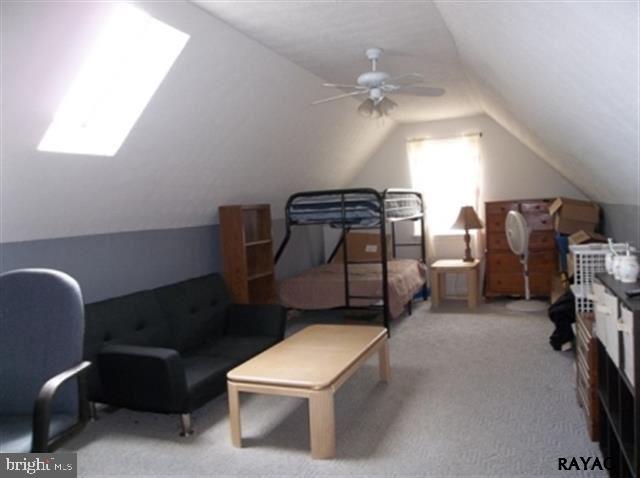 3008 Bowser Road New Freedom, PA 17349 - Photo 28 of 36 a living room with furniture a flat screen tv and a window