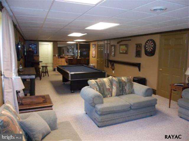 3008 Bowser Road New Freedom, PA 17349 - Photo 29 of 36 a living room with furniture and wooden floor