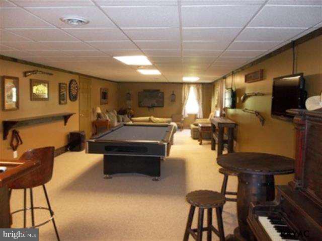 3008 Bowser Road New Freedom, PA 17349 - Photo 33 of 36 a living room with furniture and a flat screen tv