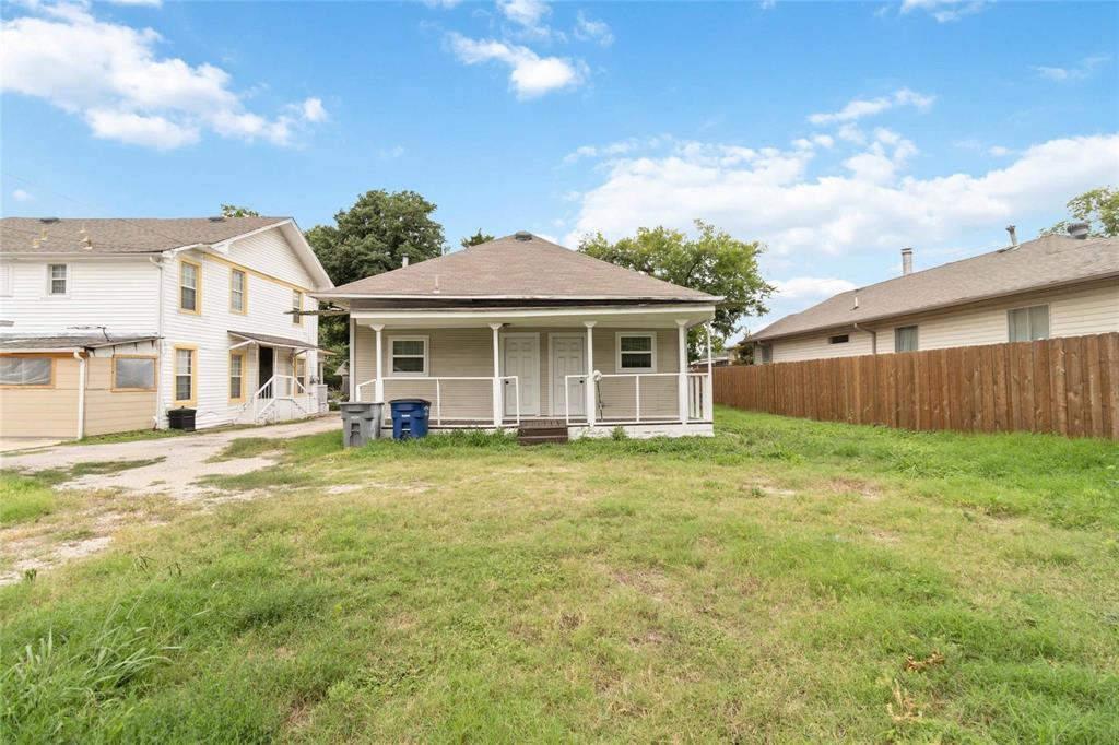 5524 Junius Street Dallas, TX 75214 - Photo 19 of 22 a view of a house with a backyard