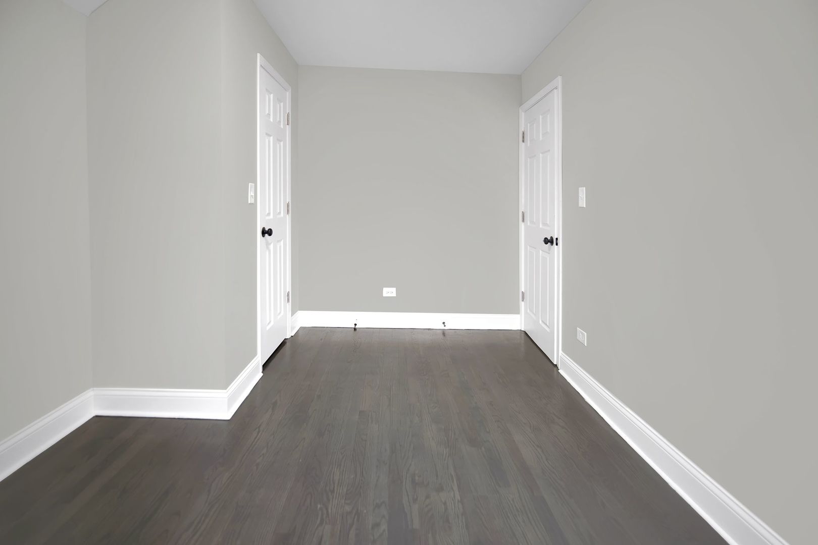 5219 West Monroe Street Chicago, IL 60644 - Photo 18 of 23 a view of an empty room with wooden floor