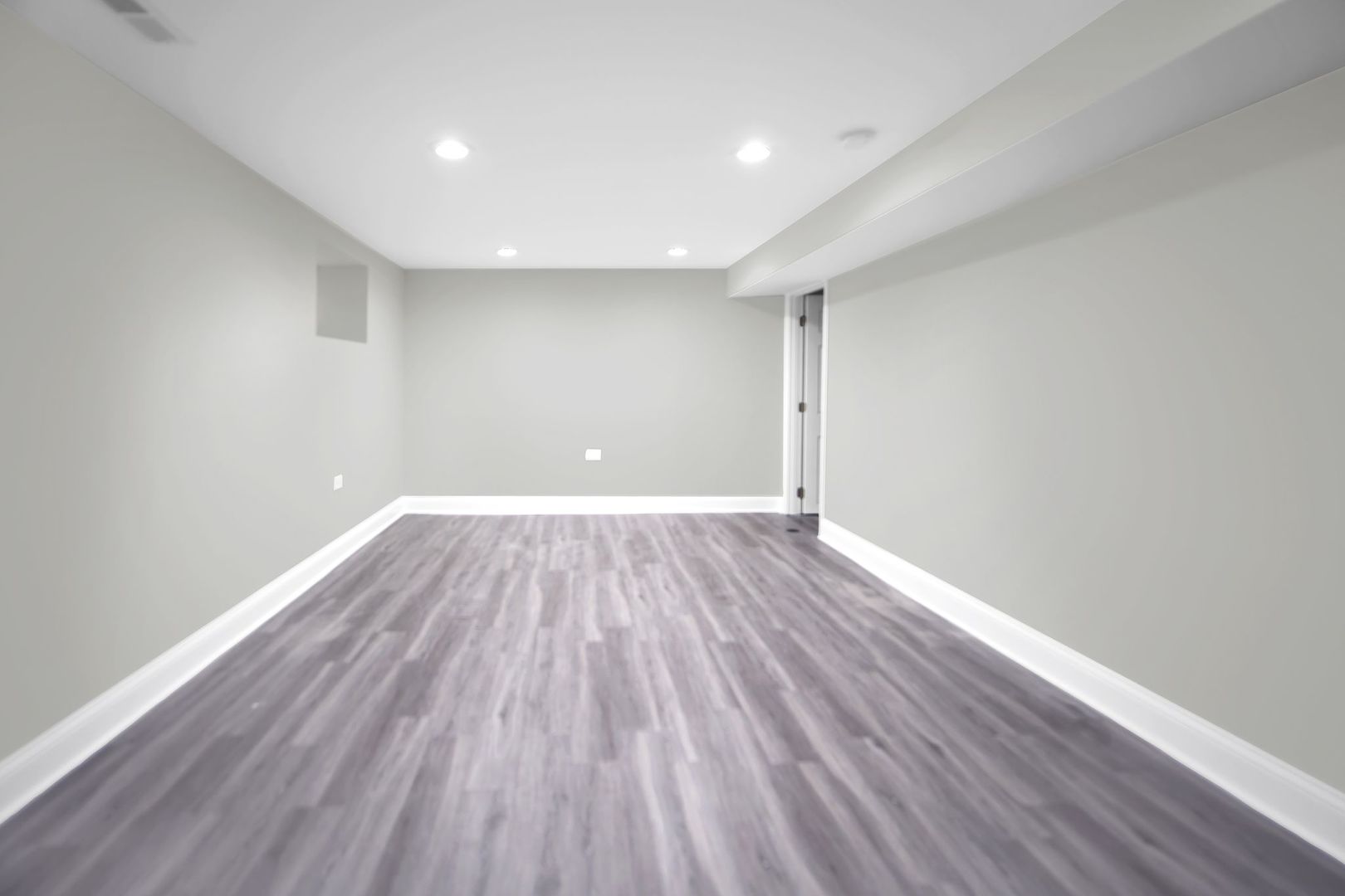 5219 West Monroe Street Chicago, IL 60644 - Photo 20 of 23 a view of room with wooden floor