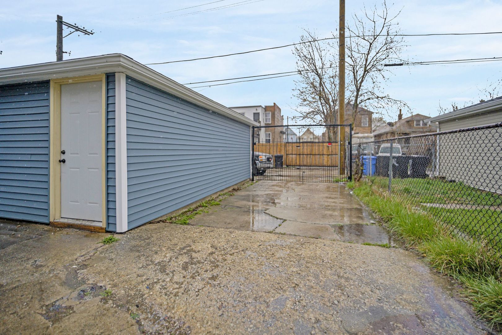 5219 West Monroe Street Chicago, IL 60644 - Photo 22 of 23 a view of a house with a yard