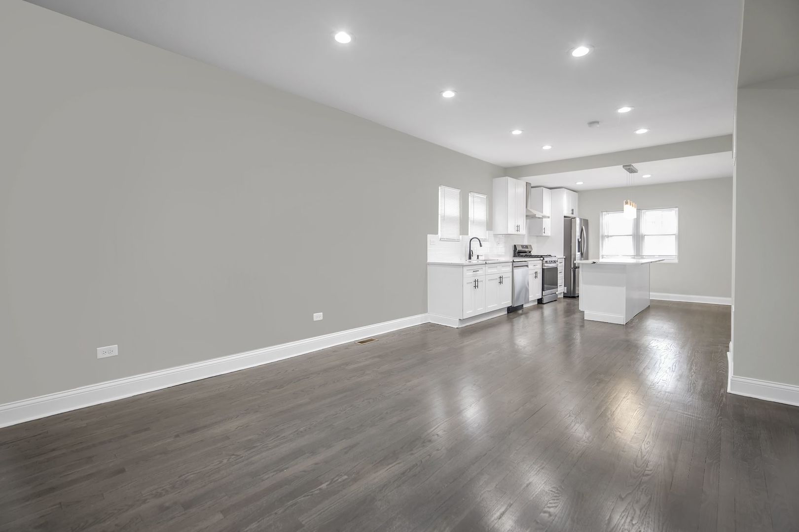 5219 West Monroe Street Chicago, IL 60644 - Photo 7 of 23 a view of a kitchen and an empty room
