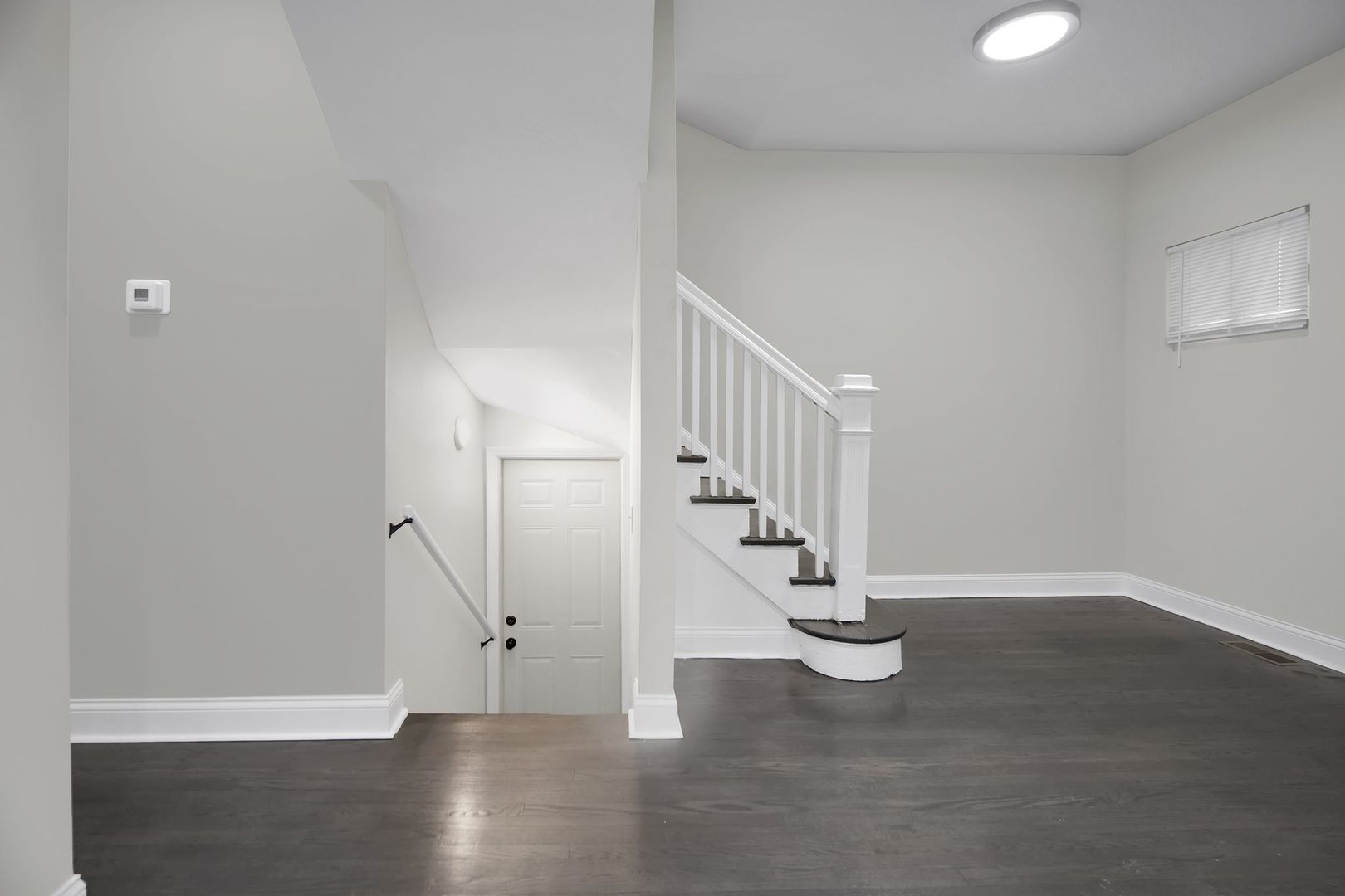 5219 West Monroe Street Chicago, IL 60644 - Photo 10 of 23 a view of entryway with wooden floor