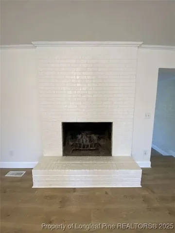 a white building with a fireplace