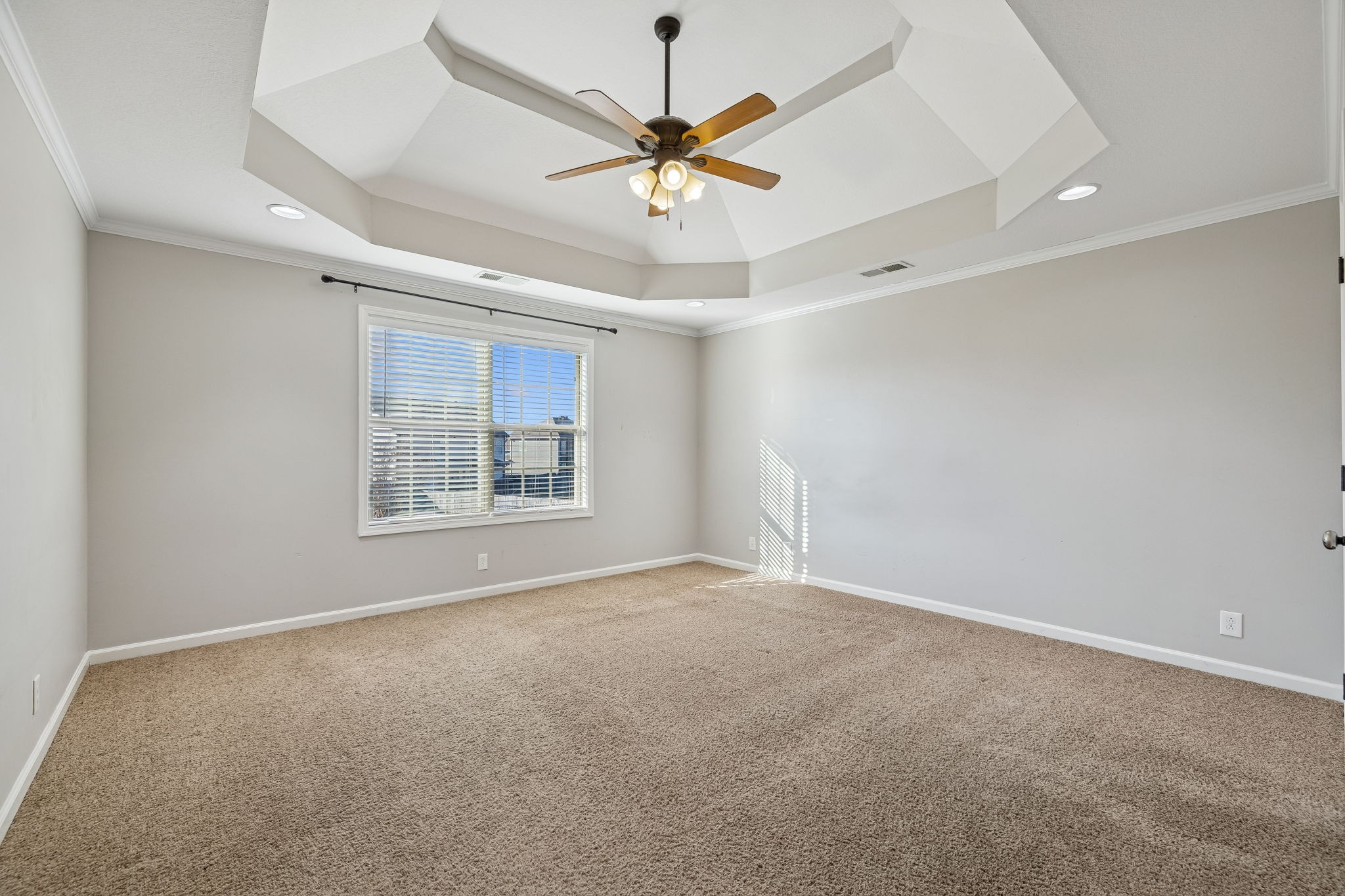 3760 Suiter Road Clarksville, TN 37040 - Photo 15 of 39 an empty room with window and ceiling fan
