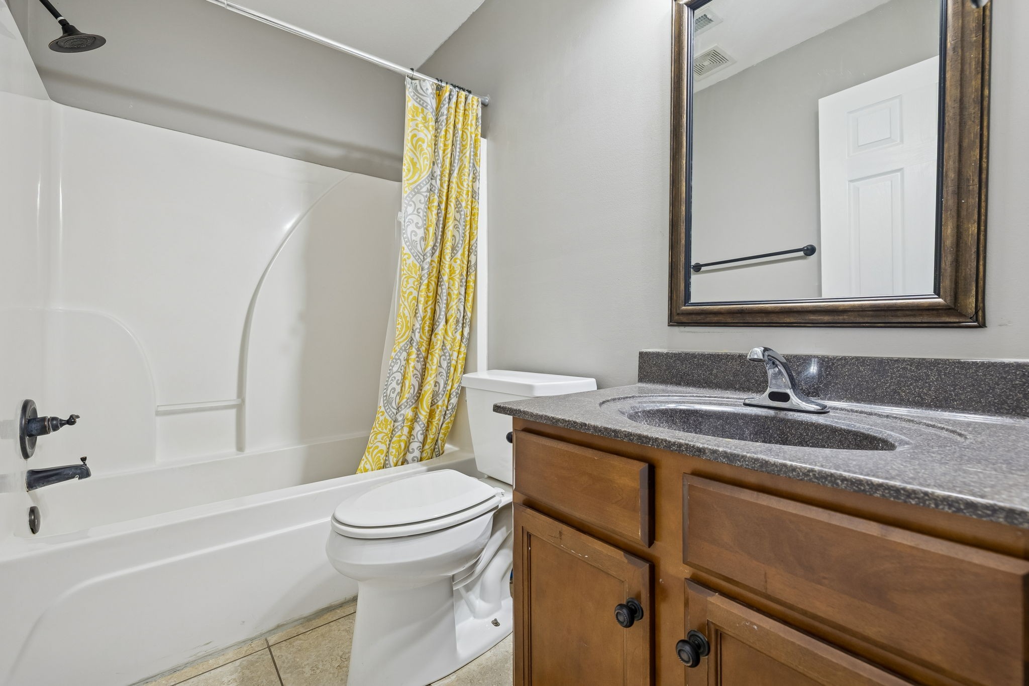 3760 Suiter Road Clarksville, TN 37040 - Photo 26 of 39 a bathroom with a granite countertop sink toilet and shower