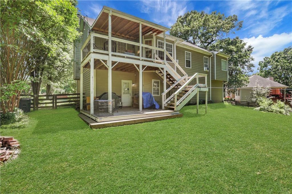 3820 Pheasant Run Trace Cumming, GA 30028 - Photo 13 of 16 a view of a house with a yard