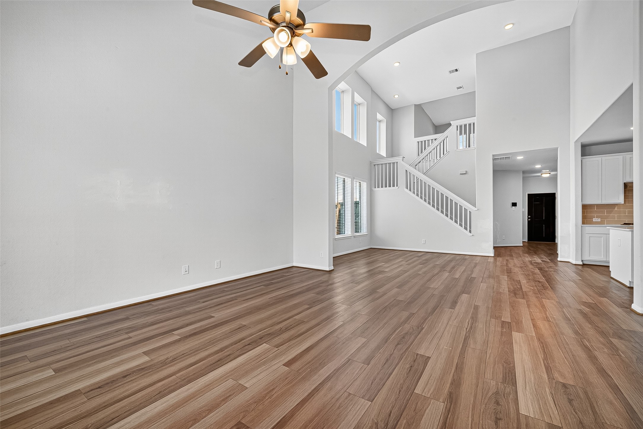 10511 Amador Peak Drive Rosharon, TX 77583 - Photo 21 of 41 a view of empty room with wooden floor and fan