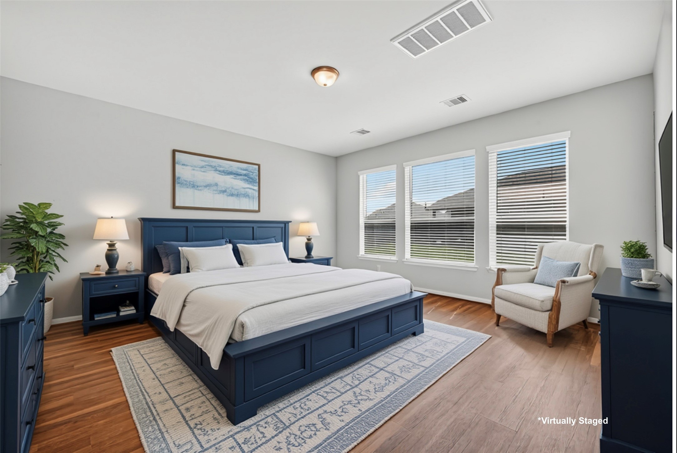 10511 Amador Peak Drive Rosharon, TX 77583 - Photo 3 of 41 a spacious bedroom with a large bed and a couch