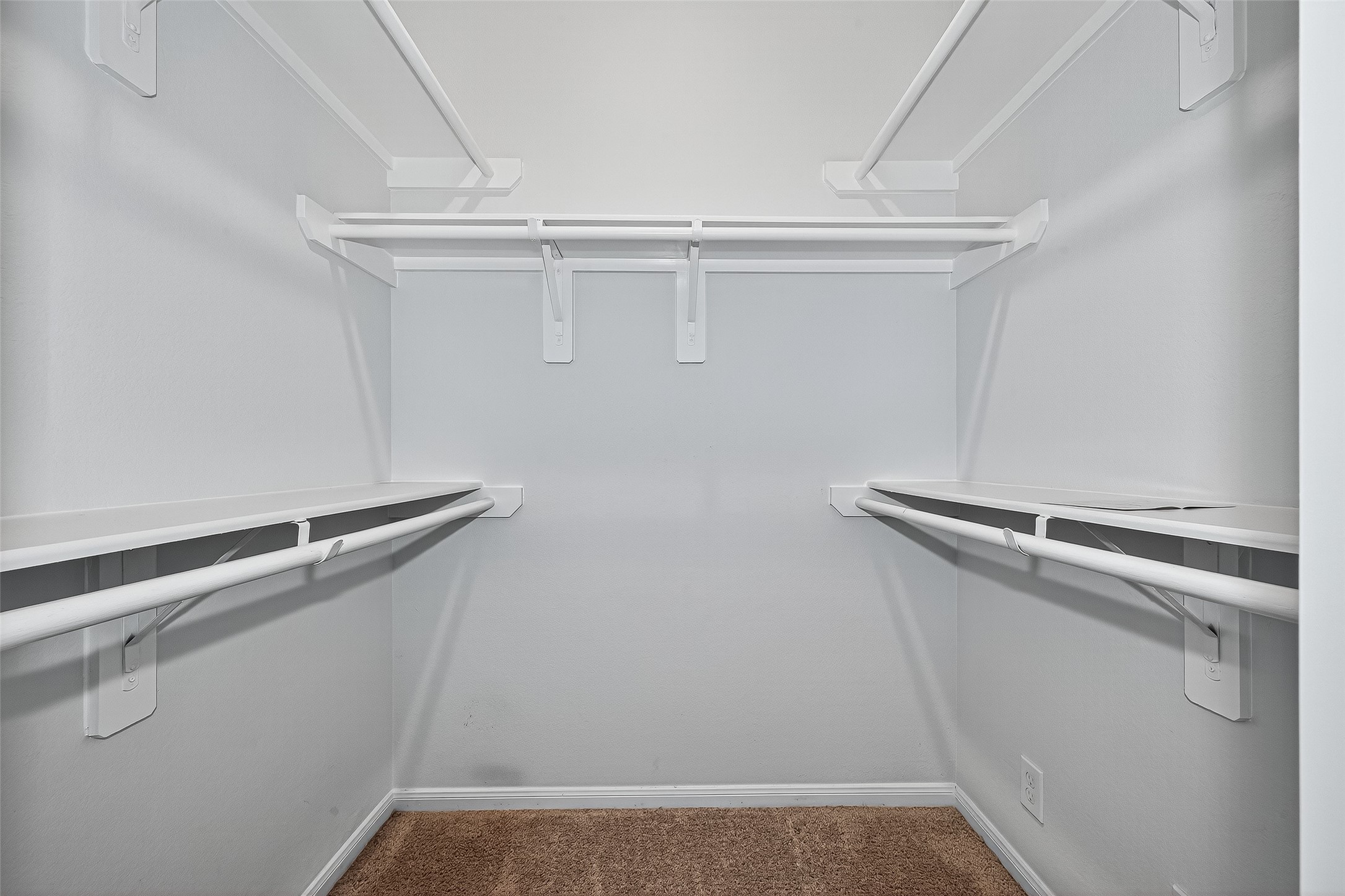 10511 Amador Peak Drive Rosharon, TX 77583 - Photo 31 of 41 a view of a room with racks on the wall