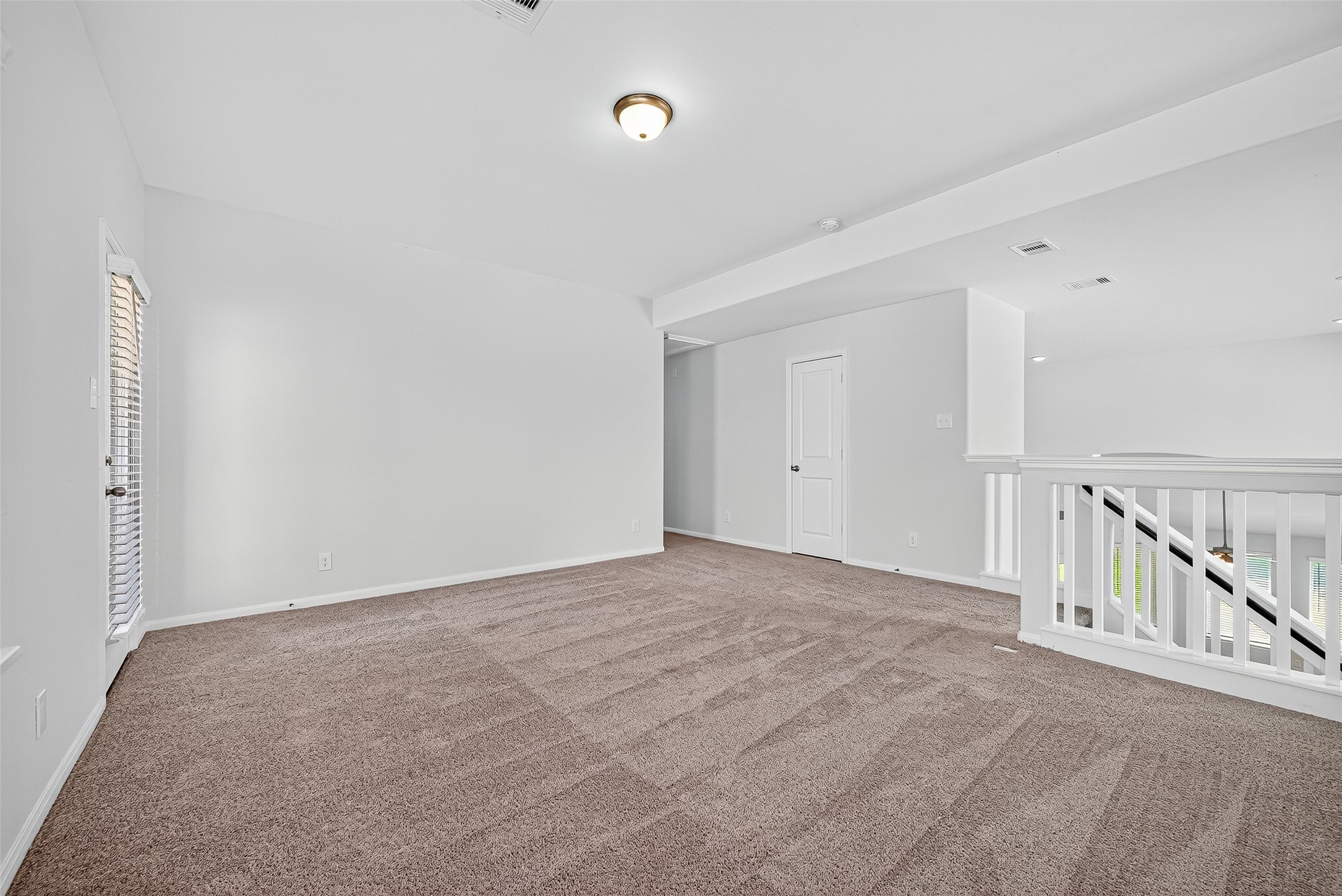 10511 Amador Peak Drive Rosharon, TX 77583 - Photo 33 of 41 a view of an empty room with stairs