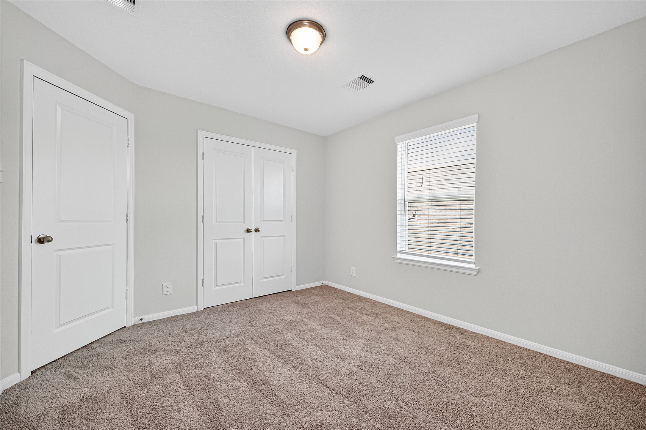 10511 Amador Peak Drive Rosharon, TX 77583 - Photo 41 of 41 Spacious 4th bedroom with neutral walls and plush carpeting