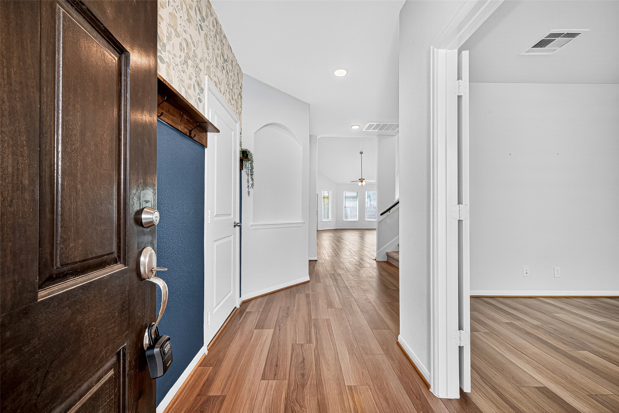 10511 Amador Peak Drive Rosharon, TX 77583 - Photo 8 of 41 a view of hallway with wooden floor