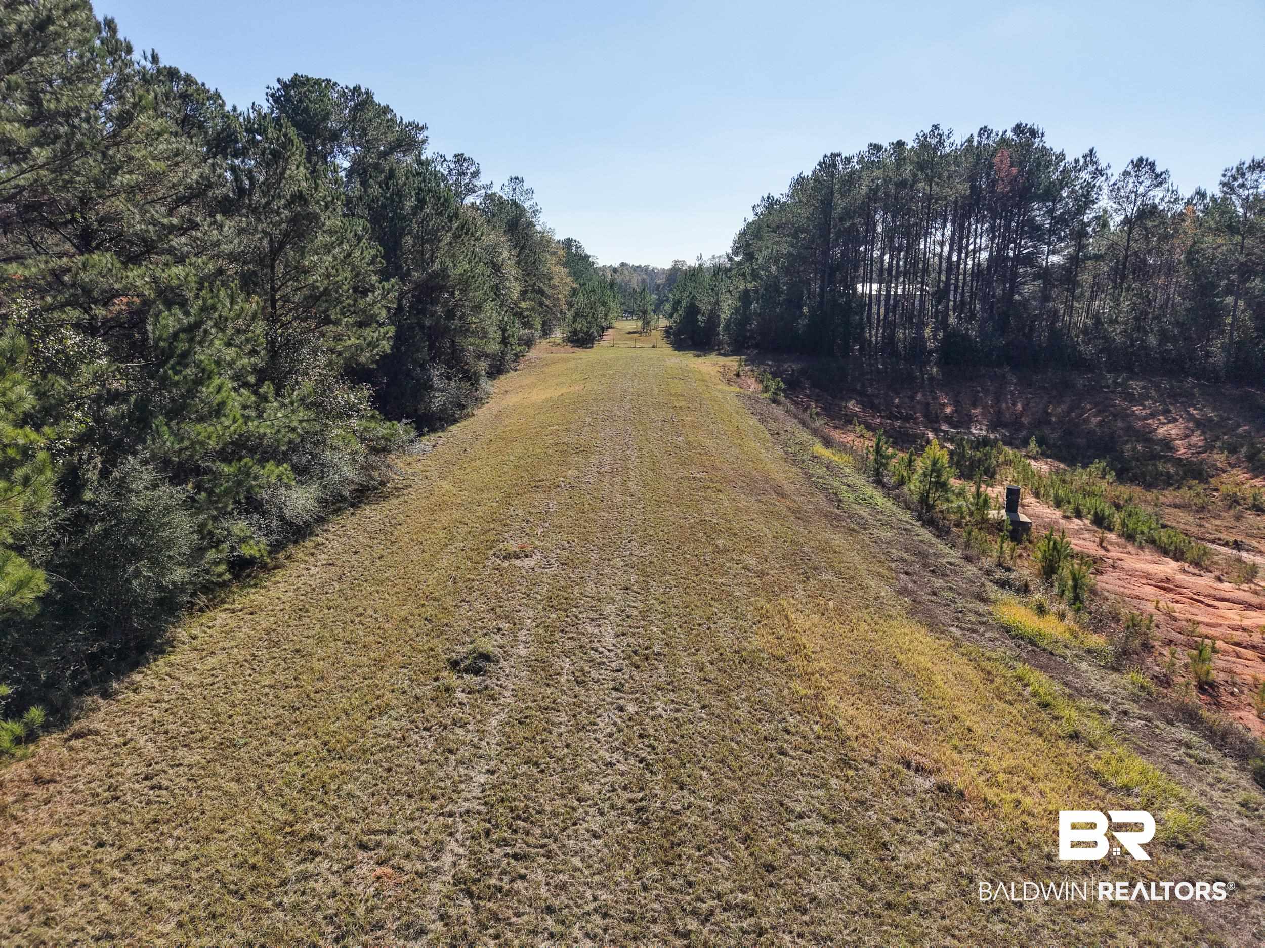 0 Stokley Court Atmore, AL 36502 - Photo 12 of 22 View of street featuring a view of countryside