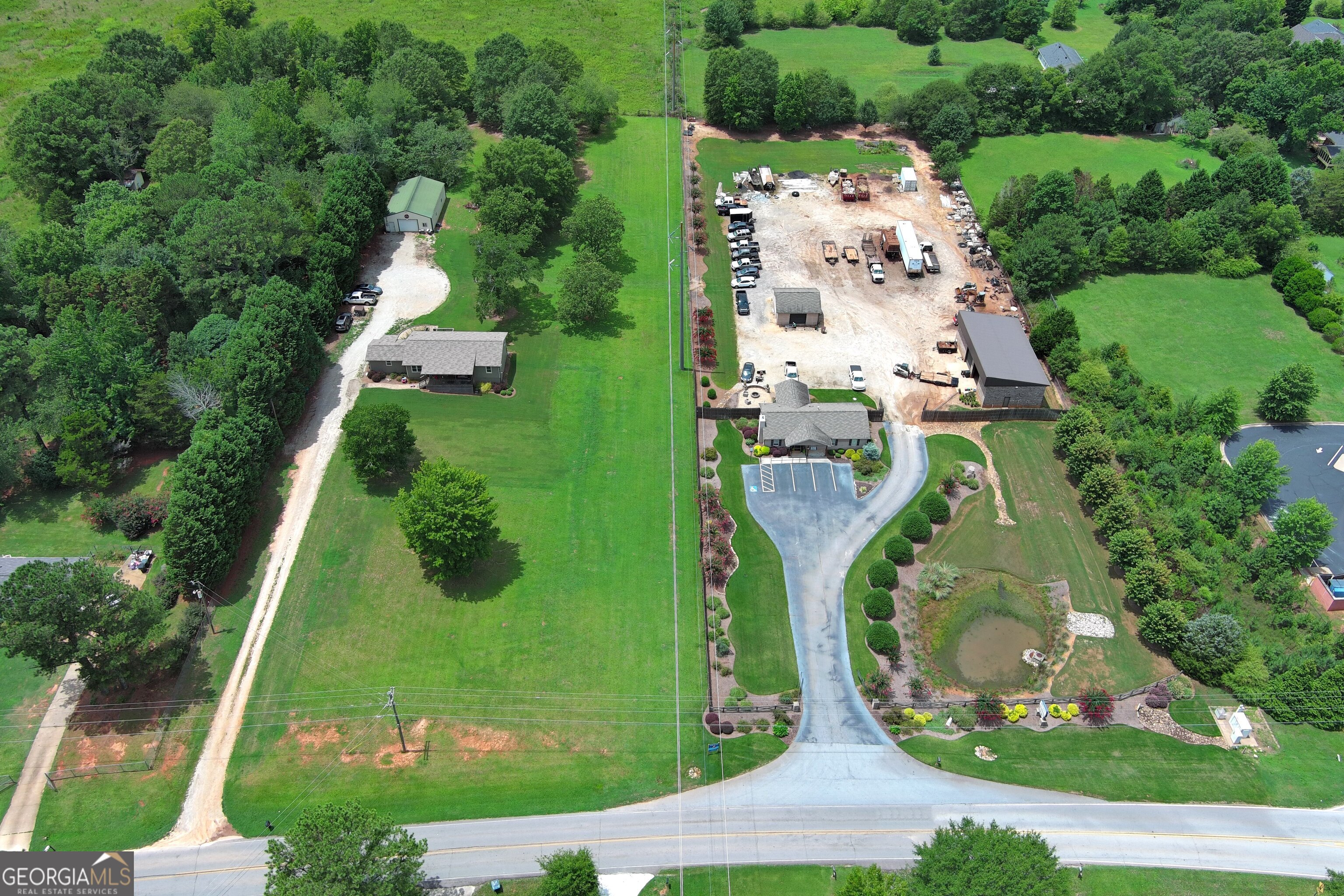 62 South Bethany Road McDonough, GA 30252 - Photo 11 of 11 an aerial view of a residential houses with outdoor space and trees all around