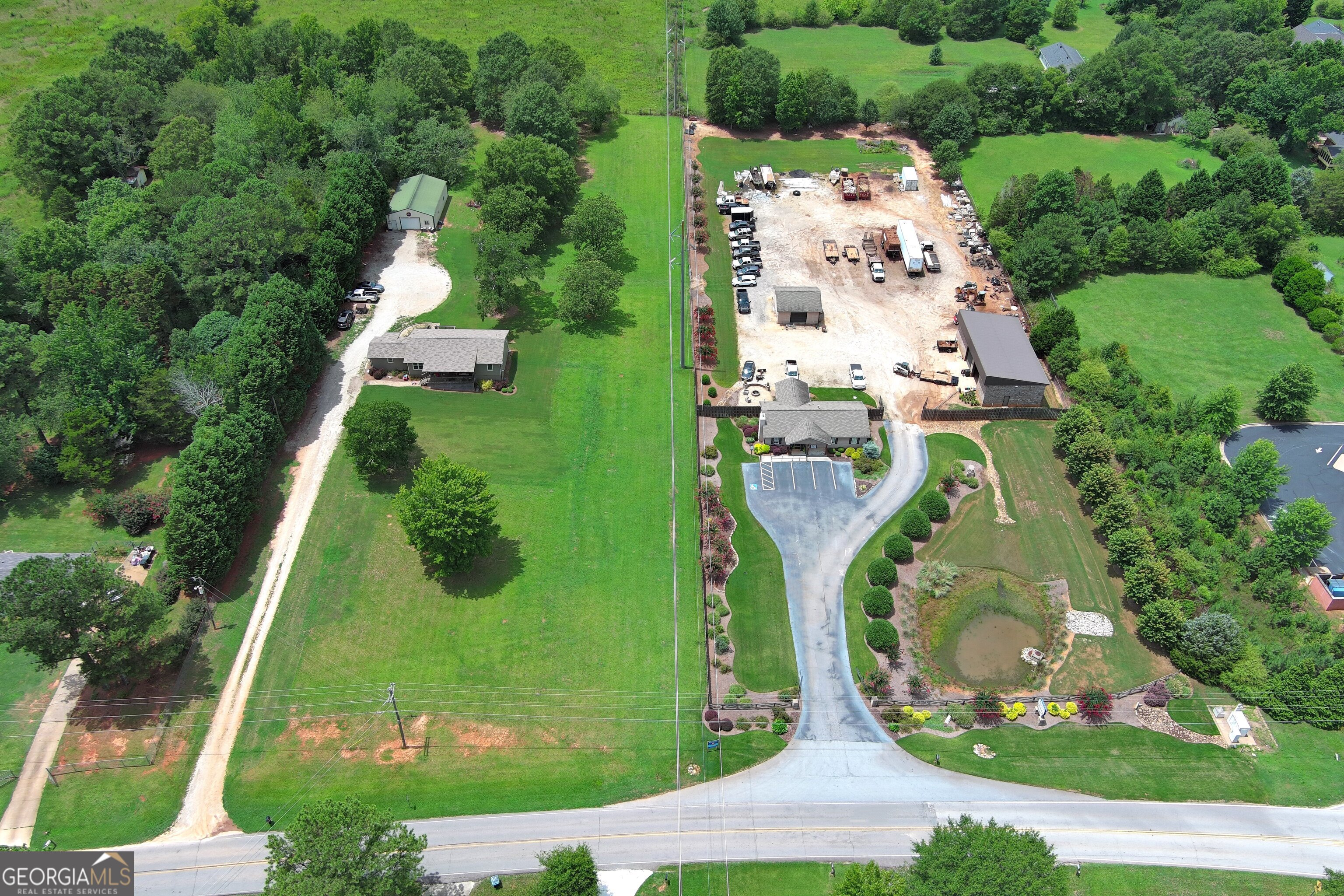62 South Bethany Road McDonough, GA 30252 - Photo 8 of 11 an aerial view of a swimming pool