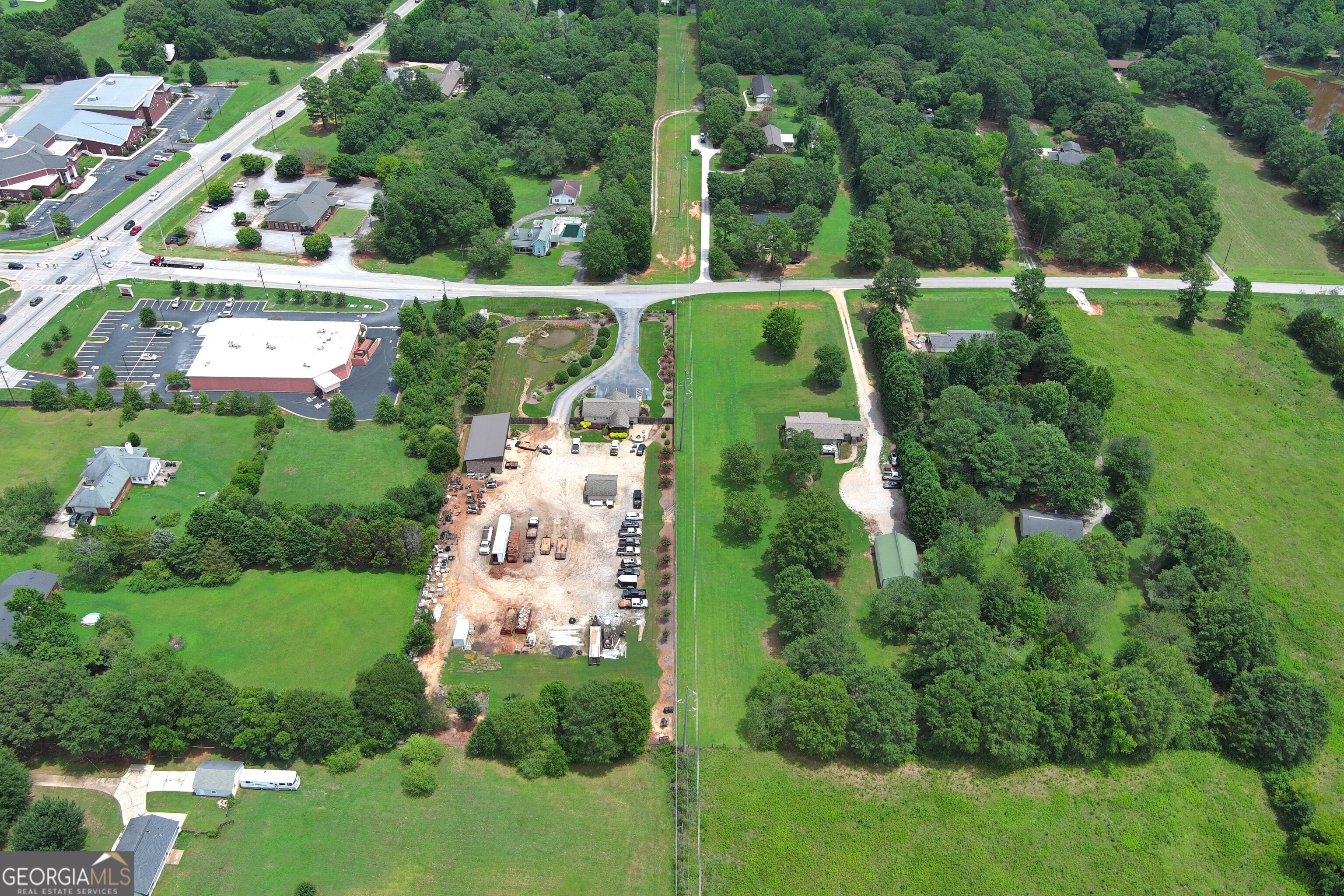 62 South Bethany Road McDonough, GA 30252 - Photo 9 of 11 an aerial view of house with yard swimming pool and outdoor seating
