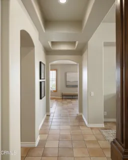 a kitchen with a sink cabinets and refrigerator