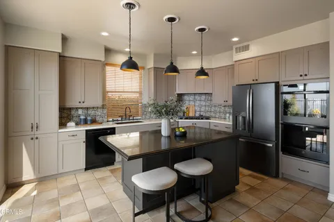 a view of a living room and dining room