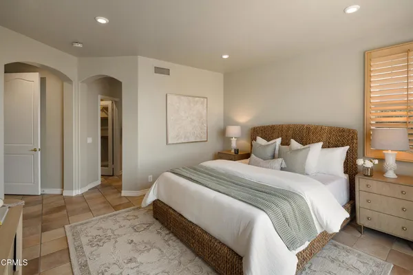 a bathroom with a bathtub and a sink