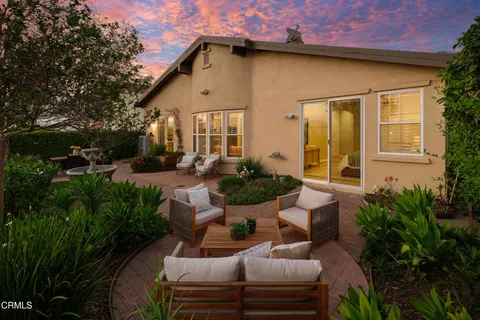 a view of a garden with palm trees
