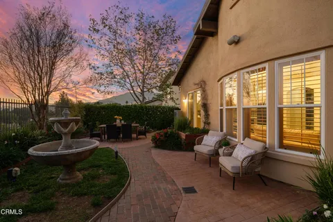 a view of a backyard with pathway