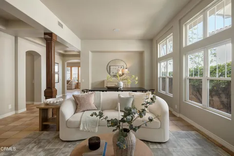a view of a dining room with furniture window and outside view