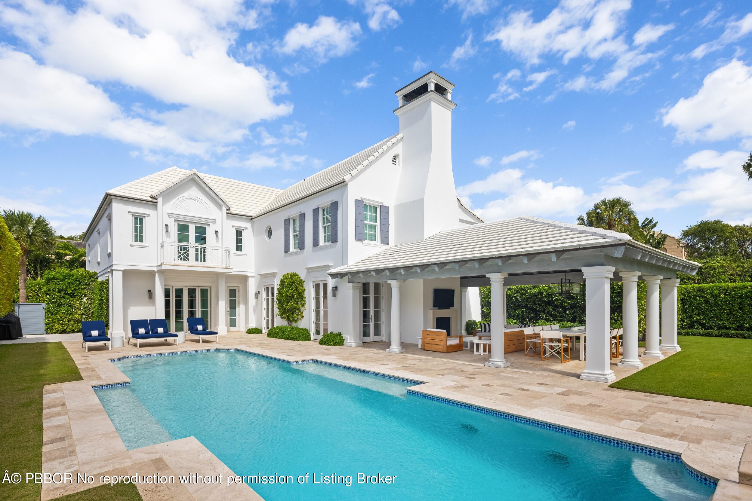 201 Banyan Road Palm Beach, FL 33480 - Photo 36 of 42 a view of a house with a swimming pool and sitting area