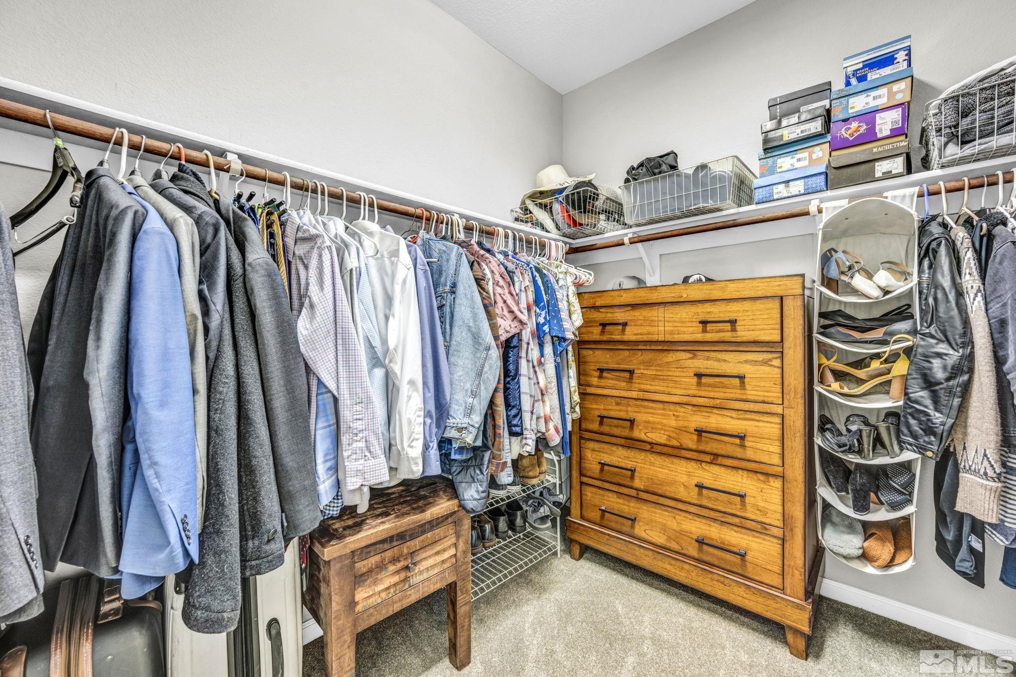 2265 Selway Drive Sparks, NV 89436 - Photo 18 of 39 a view of walk in closet with clothes and shoes