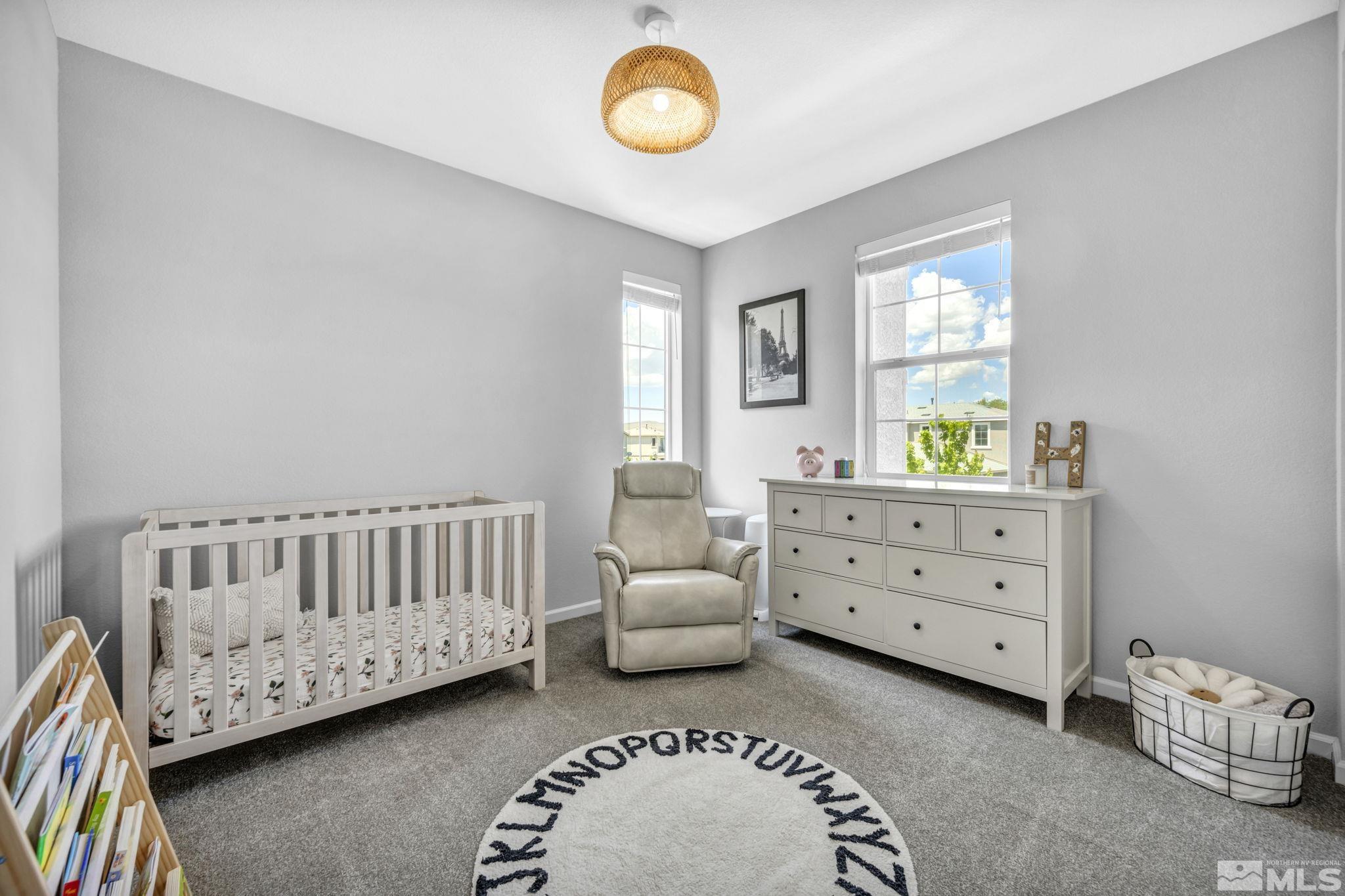 2265 Selway Drive Sparks, NV 89436 - Photo 25 of 39 a bedroom with a bed and a window