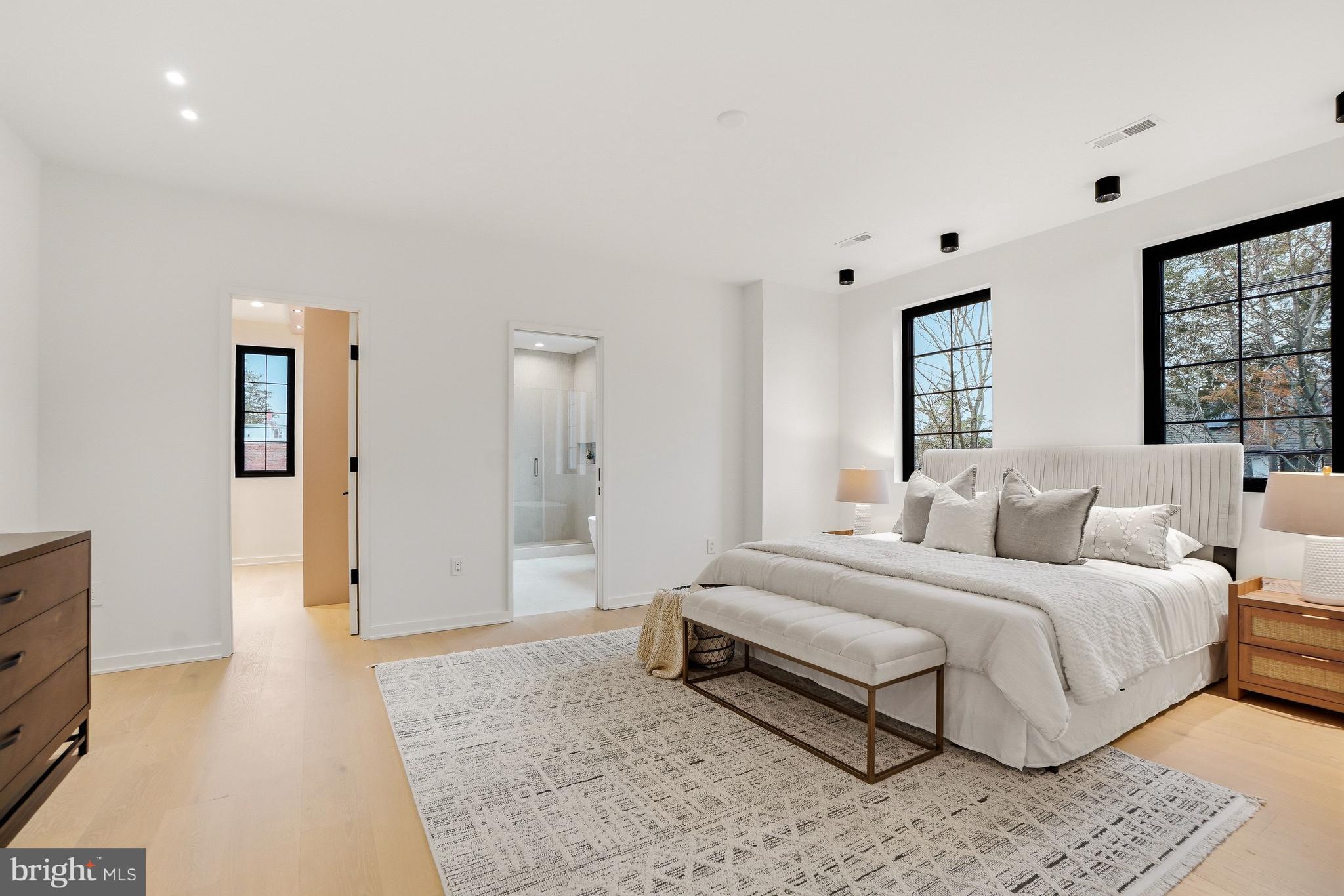 3554 T Street Northwest Washington, DC 20007 - Photo 23 of 57 a spacious bedroom with a bed and a couch