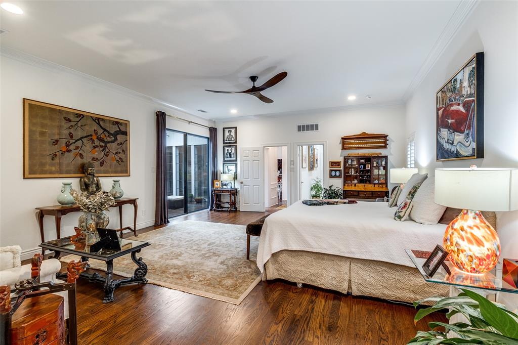 5723 Overdowns Drive Dallas, TX 75230 - Photo 21 of 36 a bedroom with furniture and a large mirror