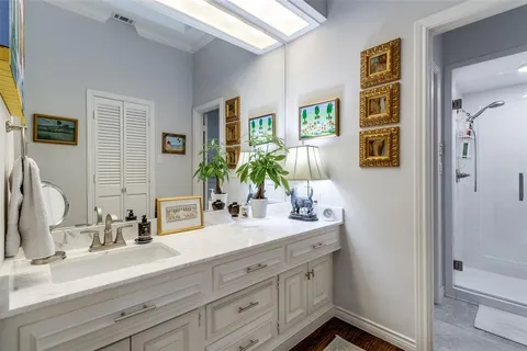 a bathroom with a tub and a shower
