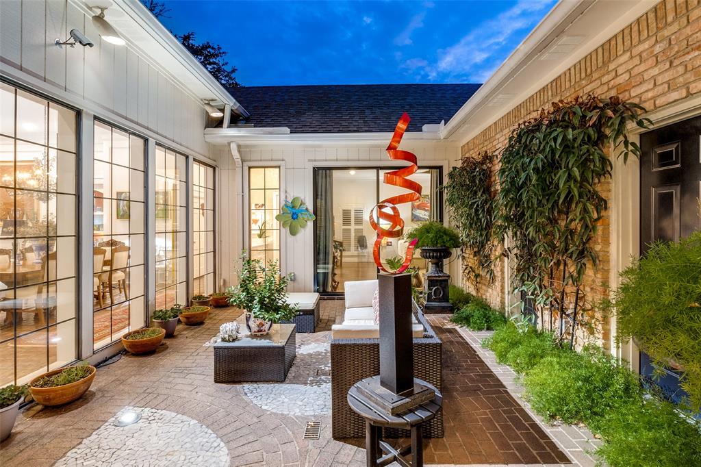 5723 Overdowns Drive Dallas, TX 75230 - Photo 32 of 36 a outdoor space with furniture and garden view